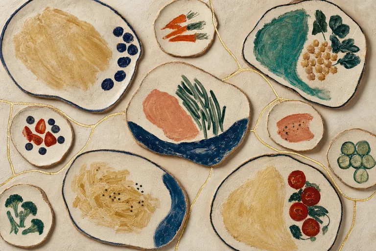 Irregular ceramic plate tiles hold varied meal-like brush fields along a wandering gold grout line.